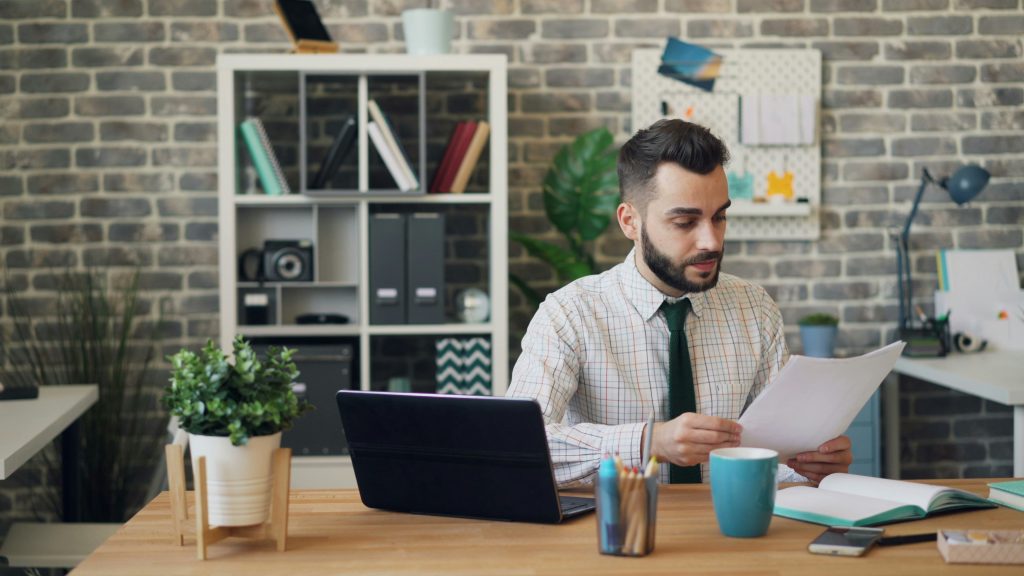 man reviewing a contract